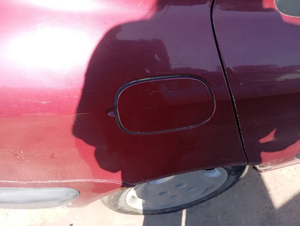 TAPA EXTERIOR COMBUSTIBLE
