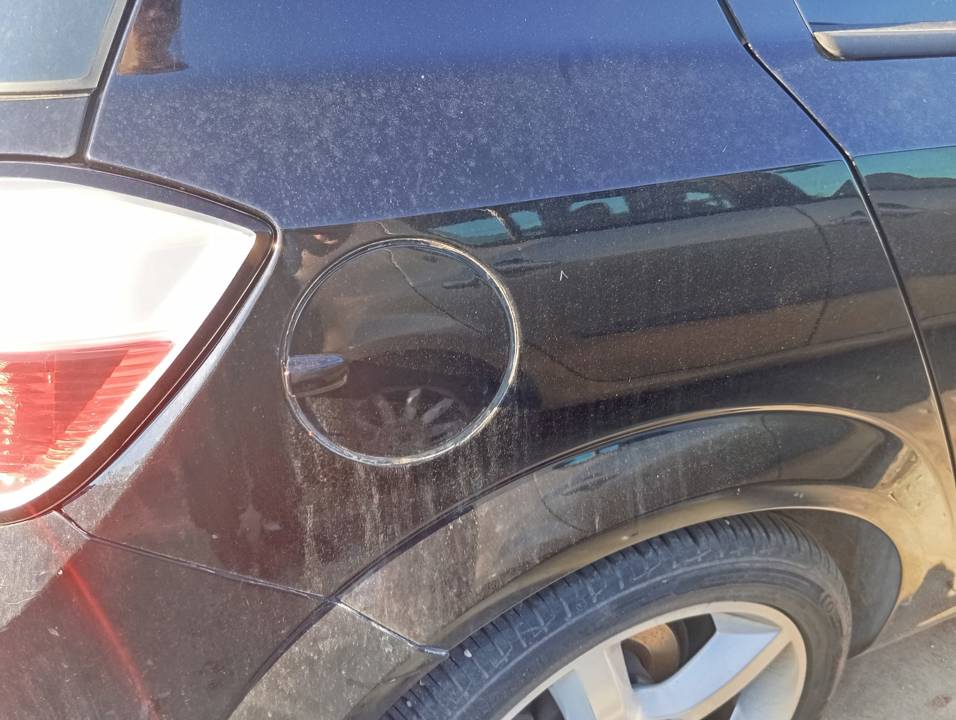 TAPA EXTERIOR COMBUSTIBLE