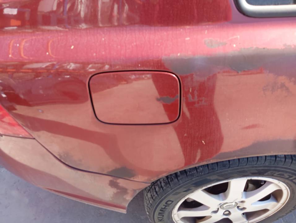 TAPA EXTERIOR COMBUSTIBLE