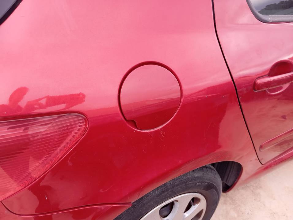TAPA EXTERIOR COMBUSTIBLE