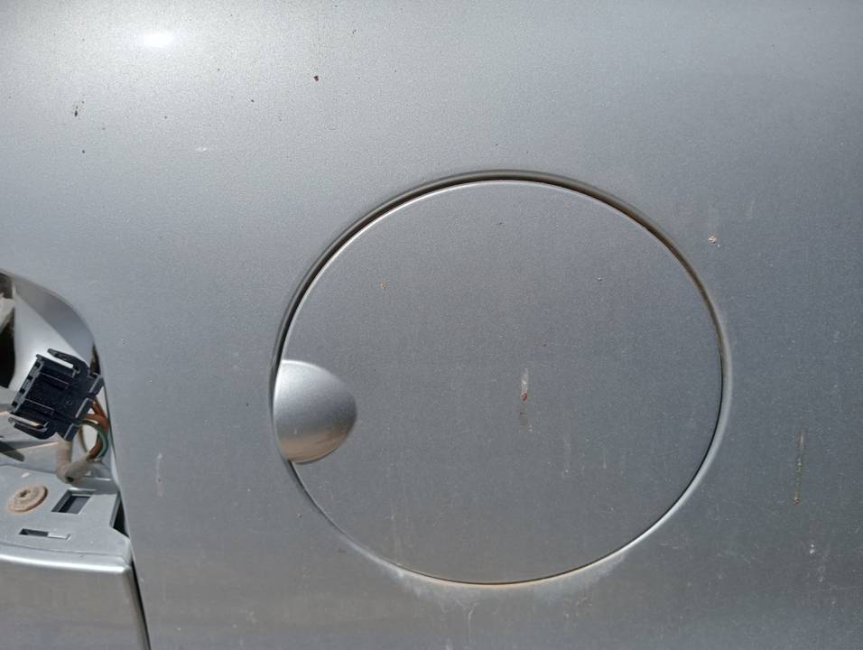 TAPA EXTERIOR COMBUSTIBLE