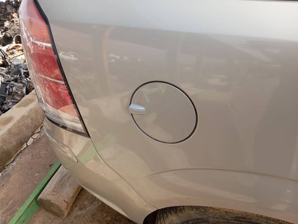 TAPA EXTERIOR COMBUSTIBLE