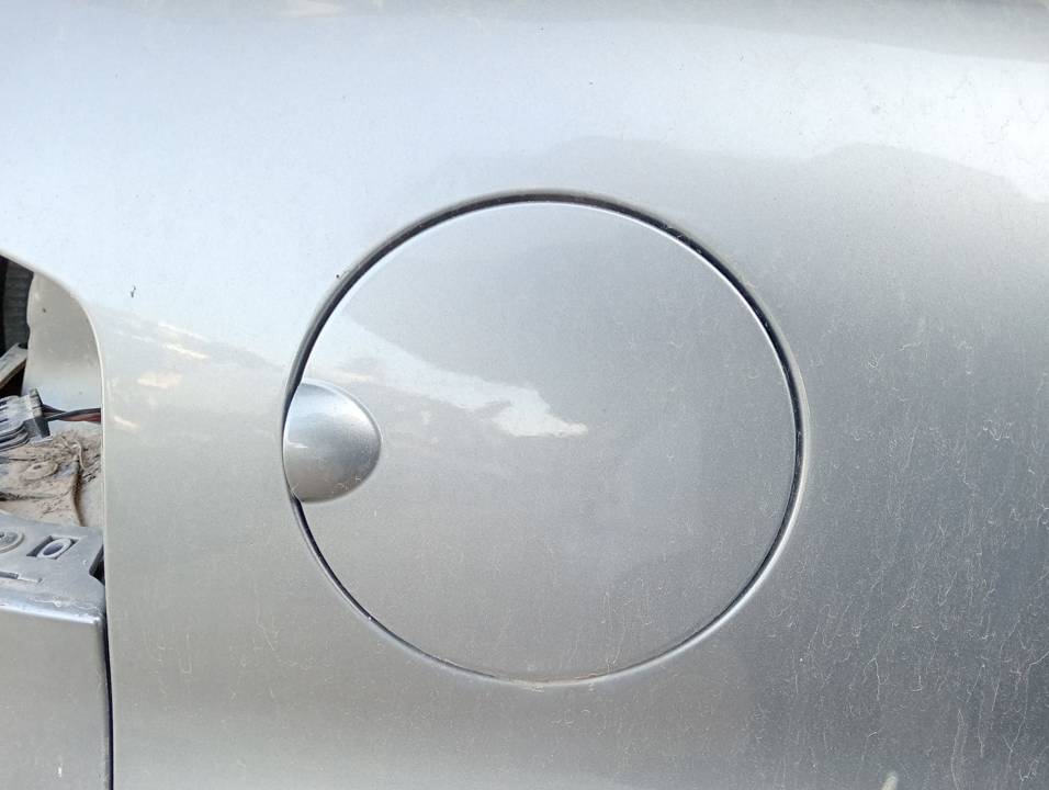 TAPA EXTERIOR COMBUSTIBLE