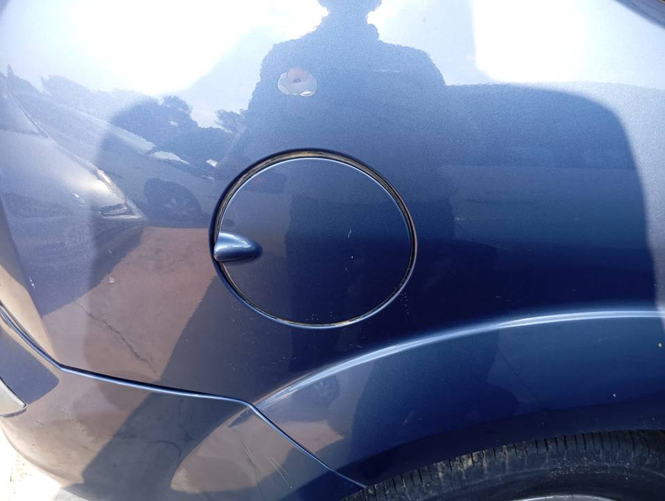 TAPA EXTERIOR COMBUSTIBLE