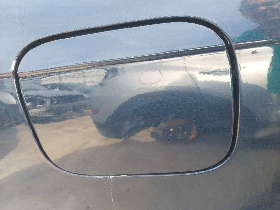 TAPA EXTERIOR COMBUSTIBLE