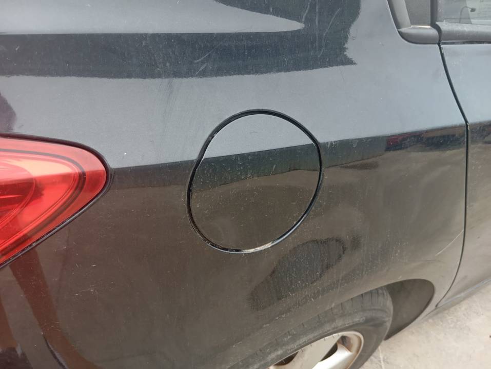 TAPA EXTERIOR COMBUSTIBLE