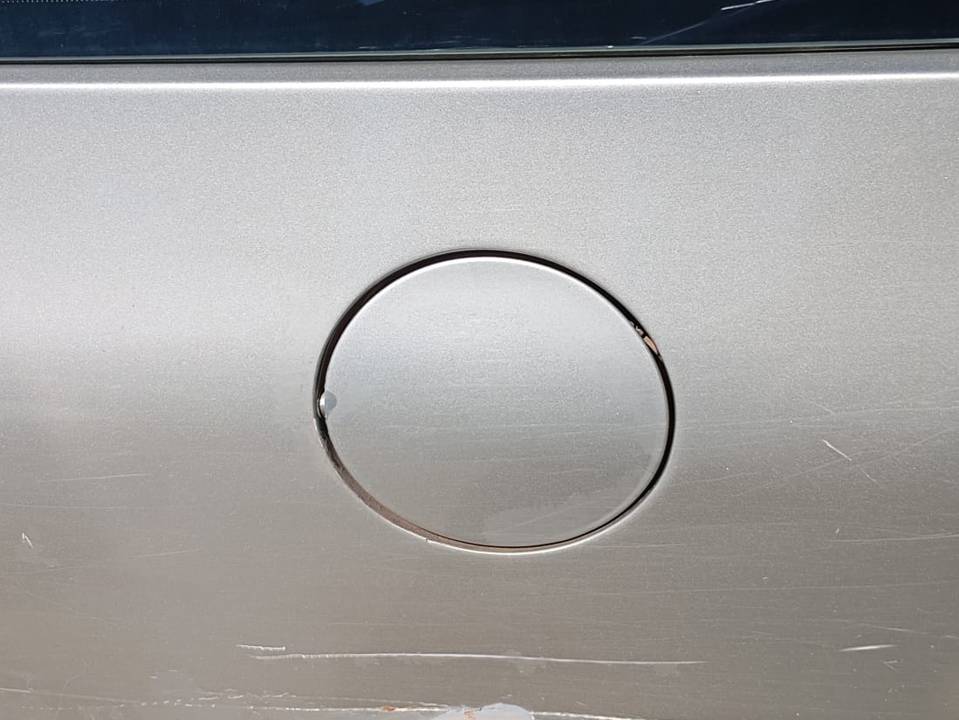 TAPA EXTERIOR COMBUSTIBLE