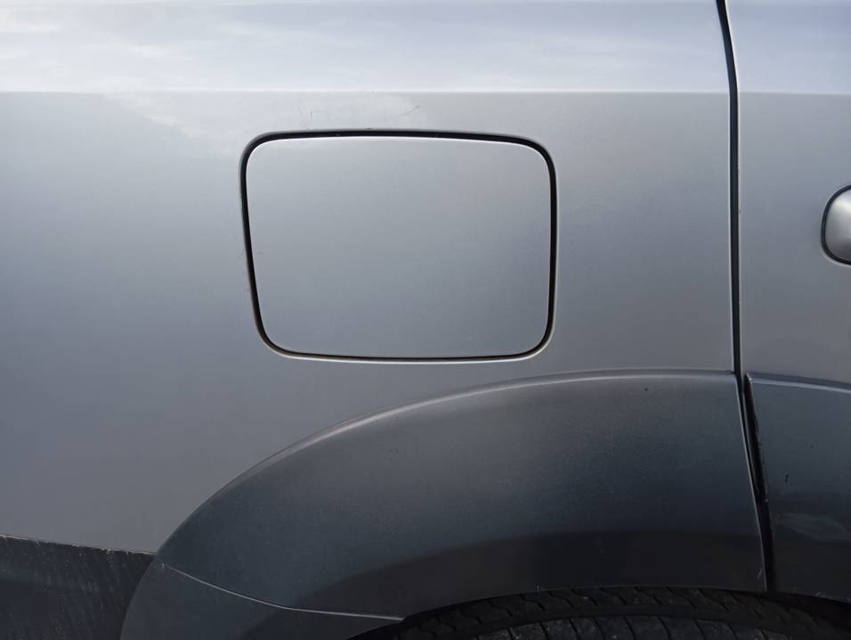 TAPA EXTERIOR COMBUSTIBLE
