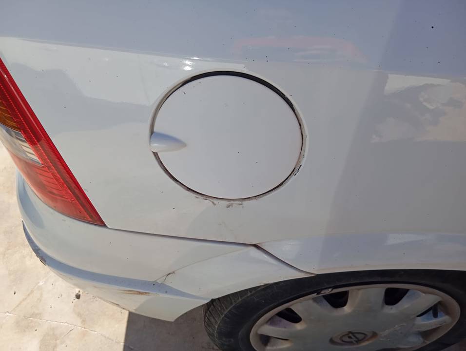 TAPA EXTERIOR COMBUSTIBLE