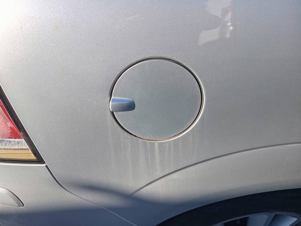 TAPA EXTERIOR COMBUSTIBLE