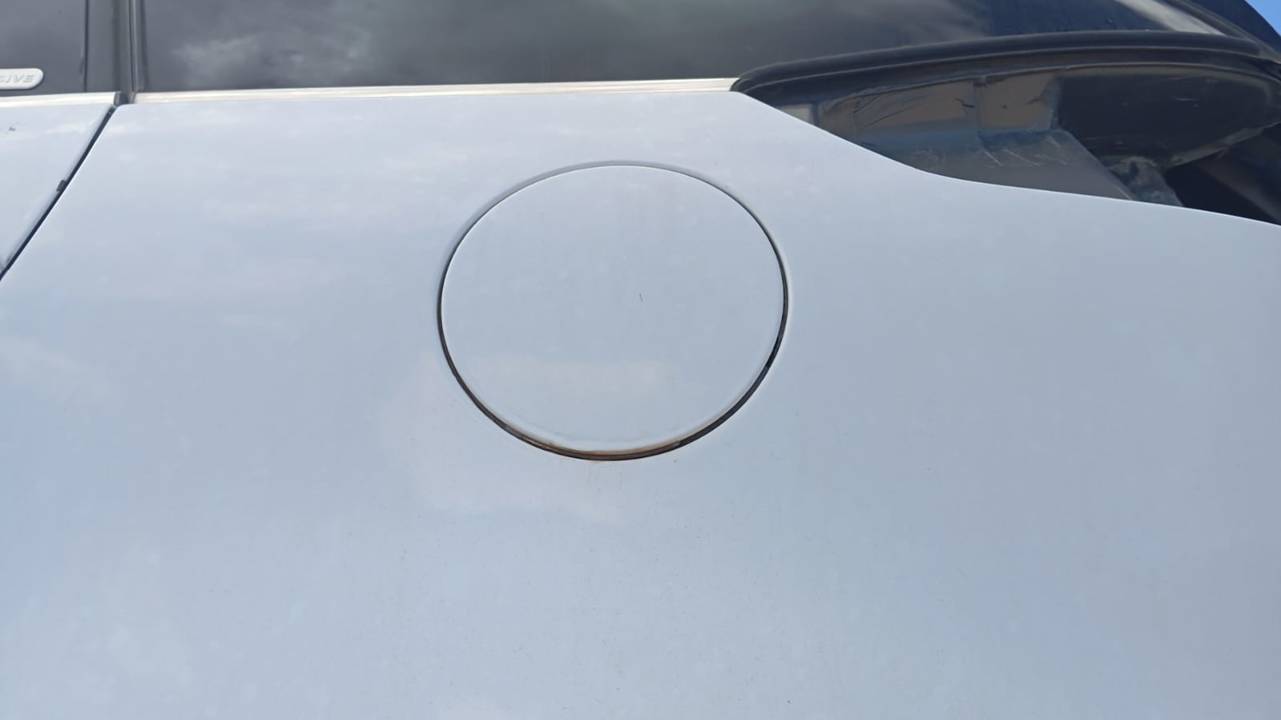 TAPA EXTERIOR COMBUSTIBLE