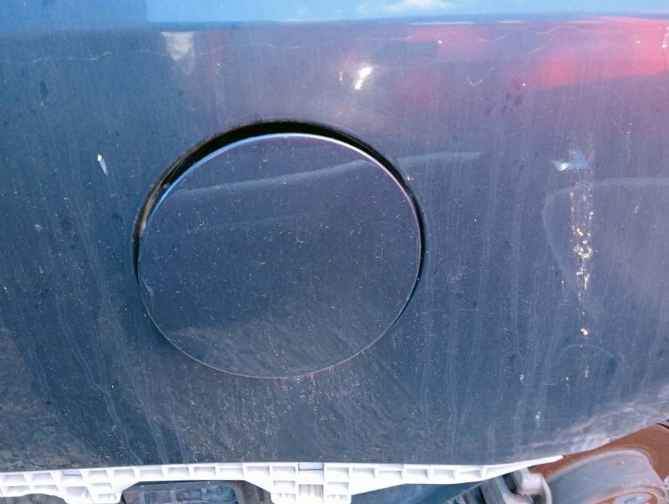 TAPA EXTERIOR COMBUSTIBLE