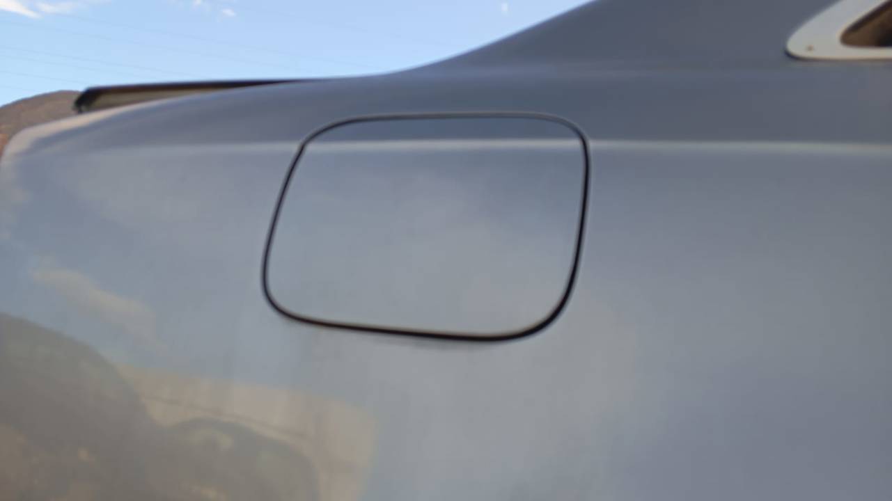 TAPA EXTERIOR COMBUSTIBLE