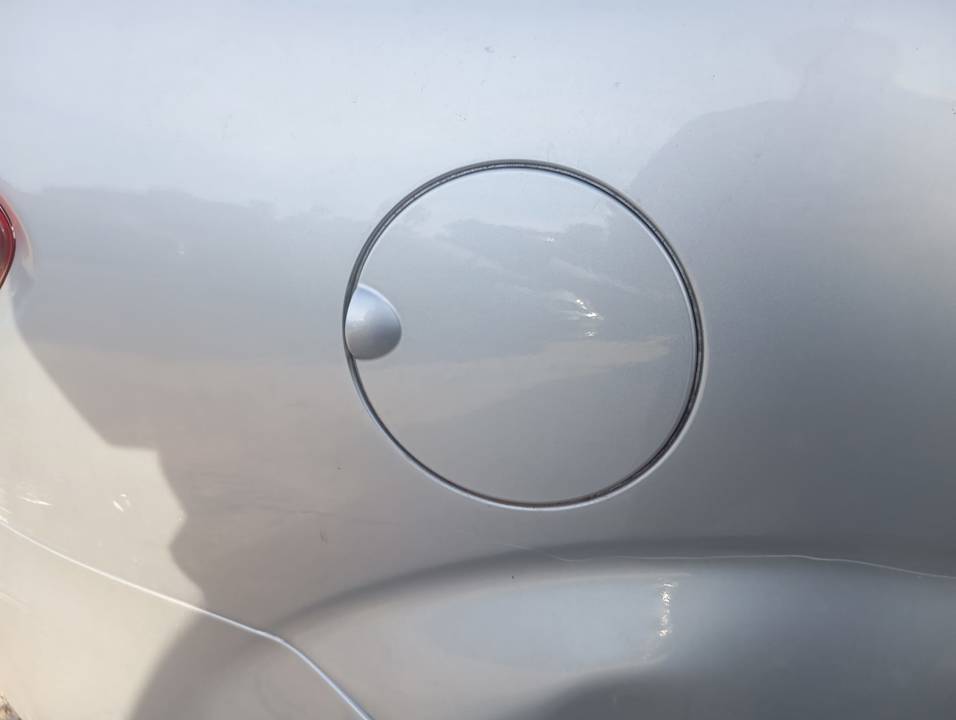 TAPA EXTERIOR COMBUSTIBLE