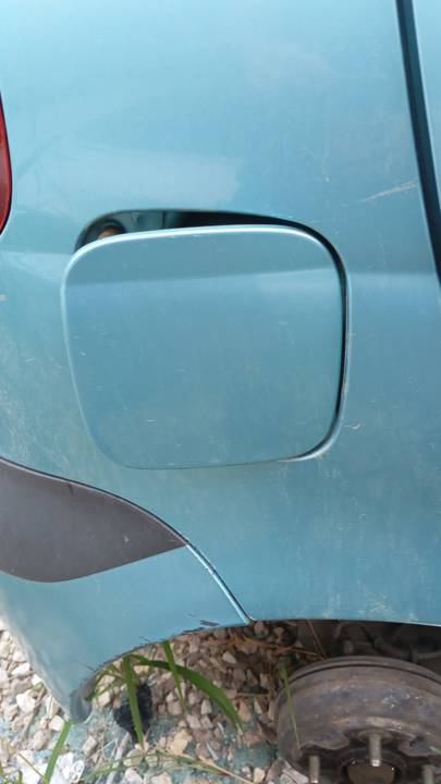TAPA EXTERIOR COMBUSTIBLE