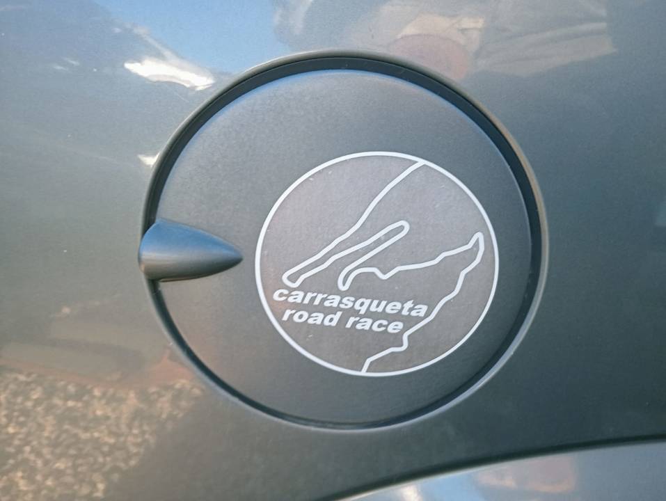 TAPA EXTERIOR COMBUSTIBLE