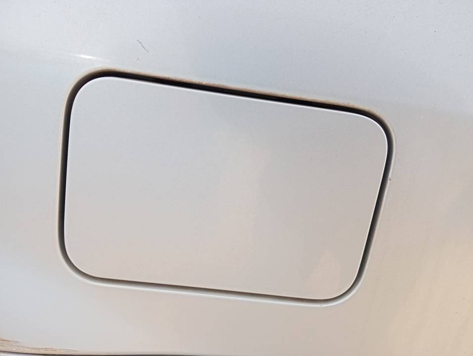 TAPA EXTERIOR COMBUSTIBLE