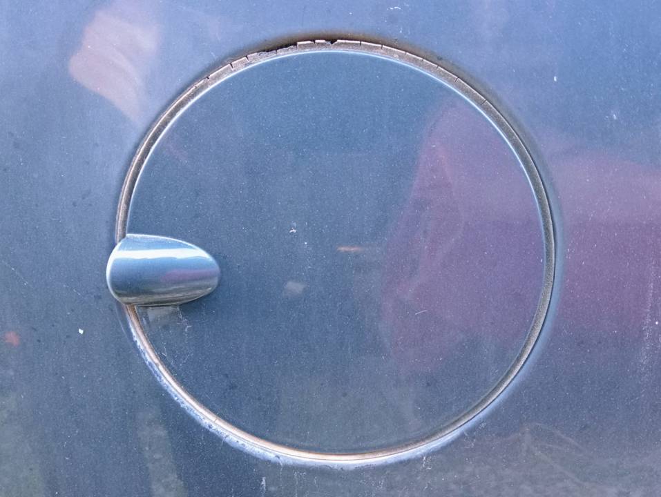 TAPA EXTERIOR COMBUSTIBLE