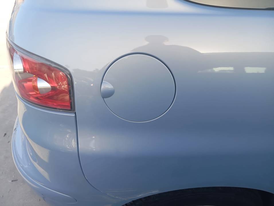 TAPA EXTERIOR COMBUSTIBLE