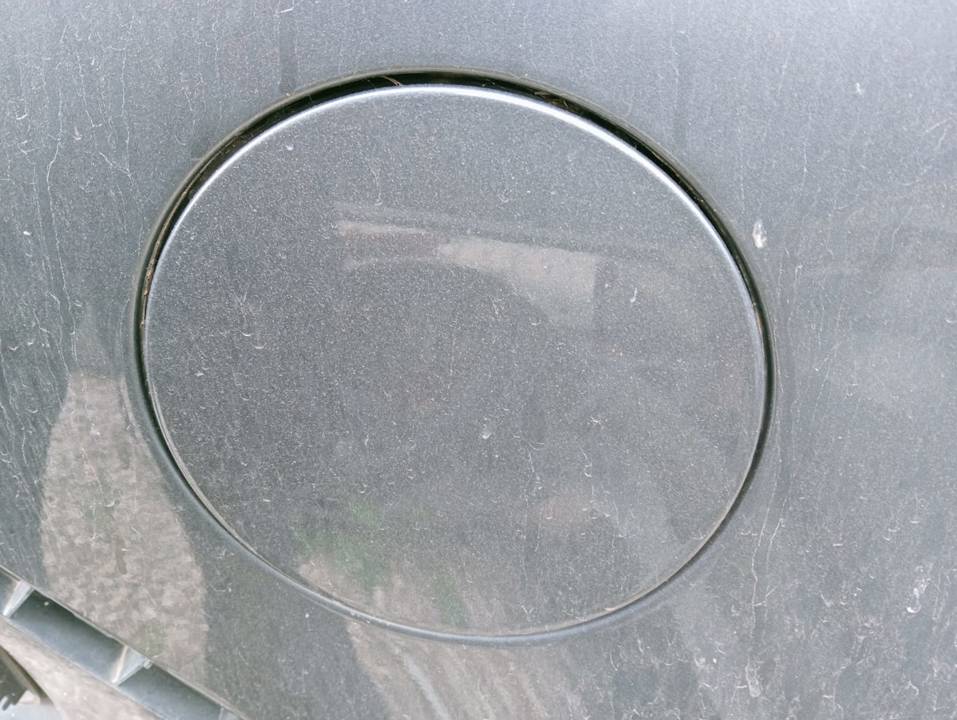 TAPA EXTERIOR COMBUSTIBLE
