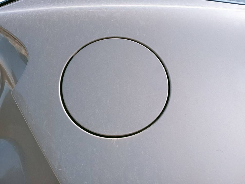 TAPA EXTERIOR COMBUSTIBLE