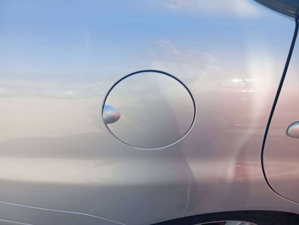 TAPA EXTERIOR COMBUSTIBLE