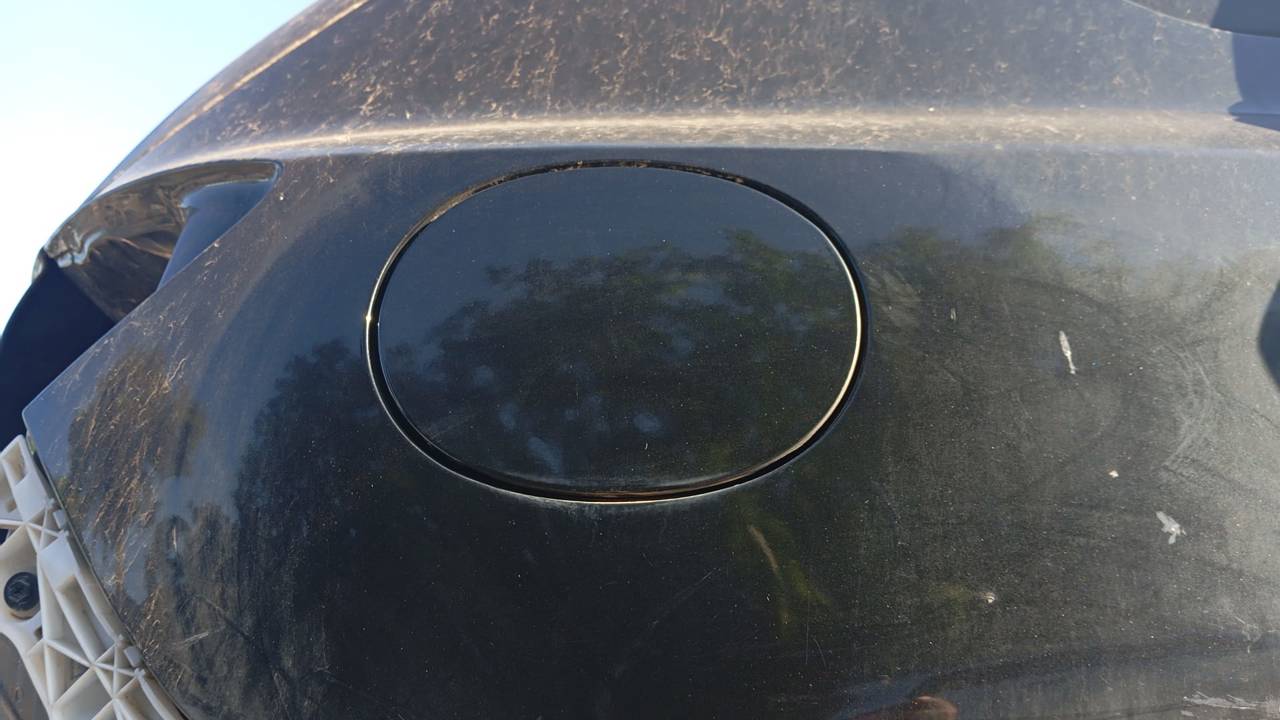 TAPA EXTERIOR COMBUSTIBLE