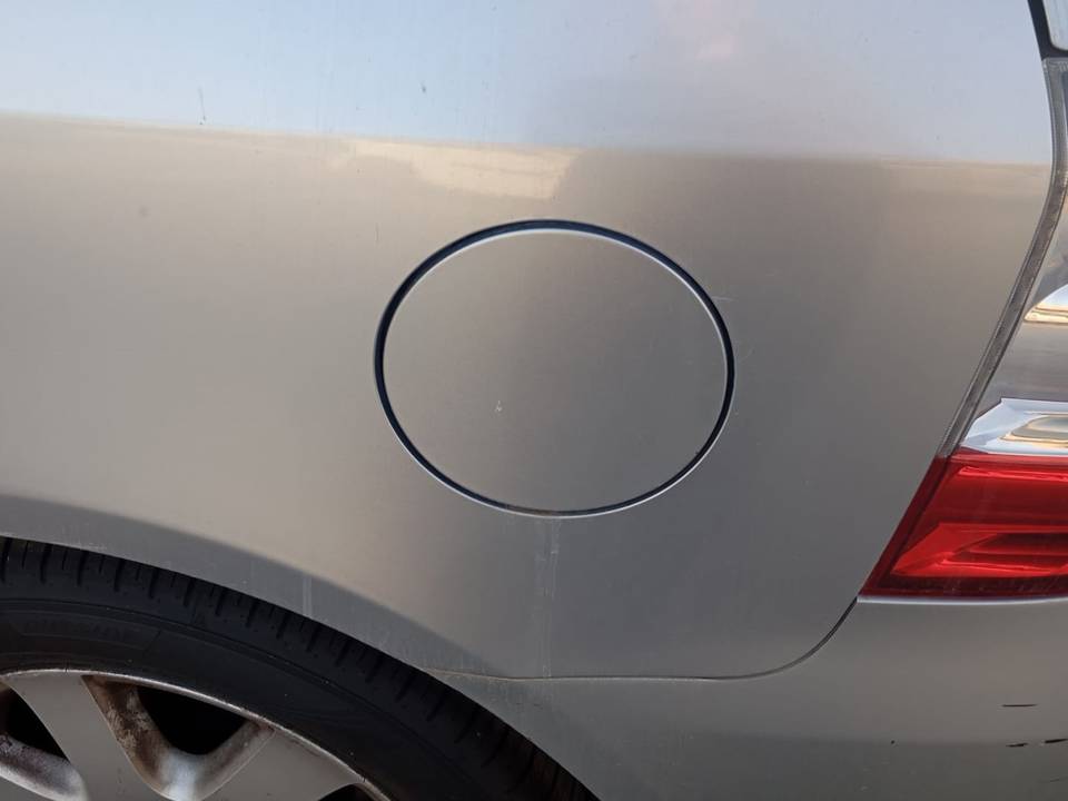 TAPA EXTERIOR COMBUSTIBLE