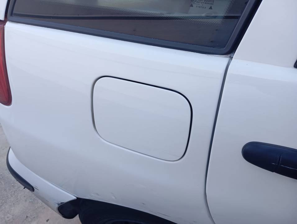 TAPA EXTERIOR COMBUSTIBLE
