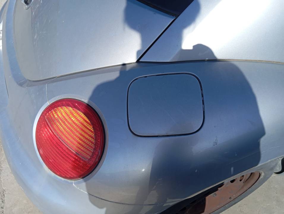 TAPA EXTERIOR COMBUSTIBLE