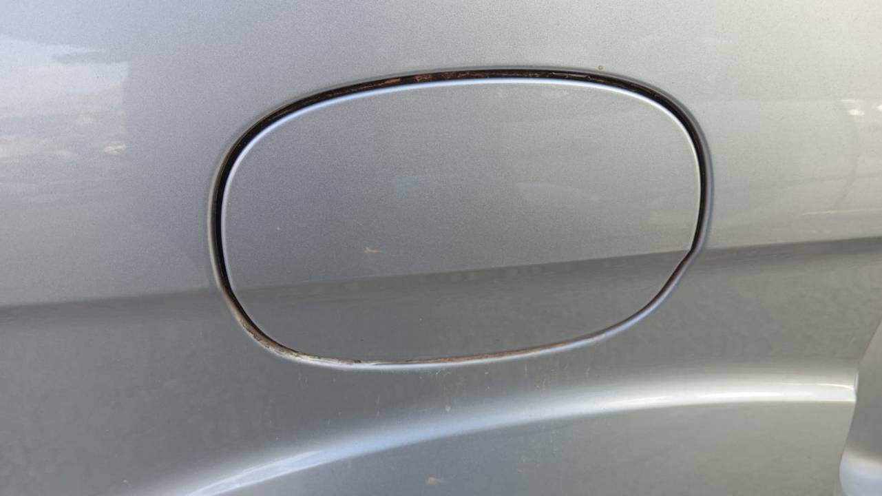 TAPA EXTERIOR COMBUSTIBLE
