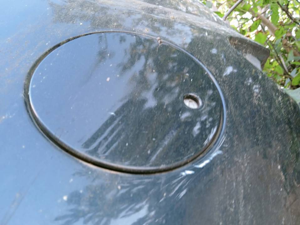 TAPA EXTERIOR COMBUSTIBLE