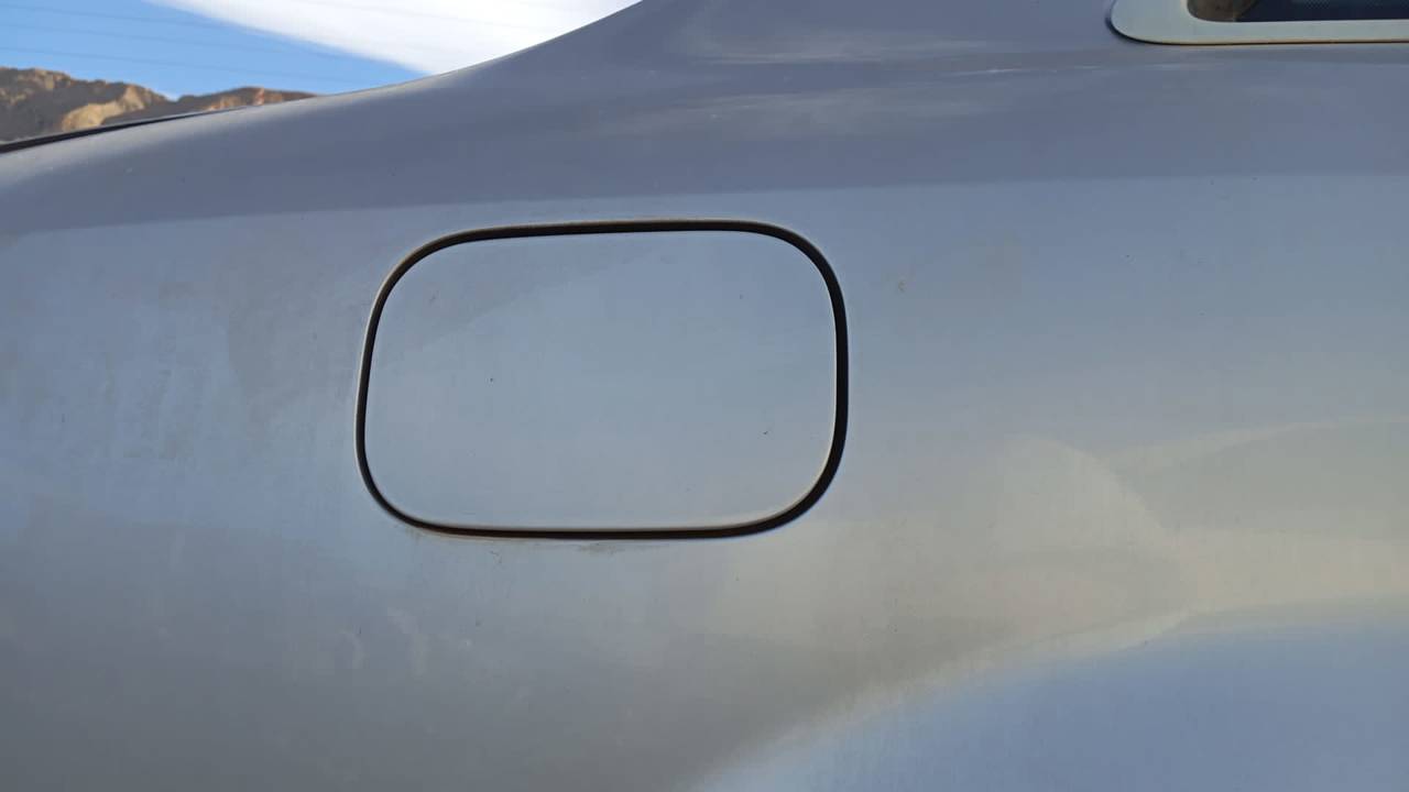 TAPA EXTERIOR COMBUSTIBLE