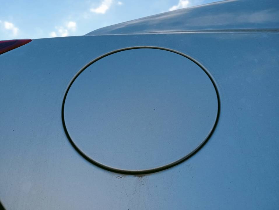 TAPA EXTERIOR COMBUSTIBLE