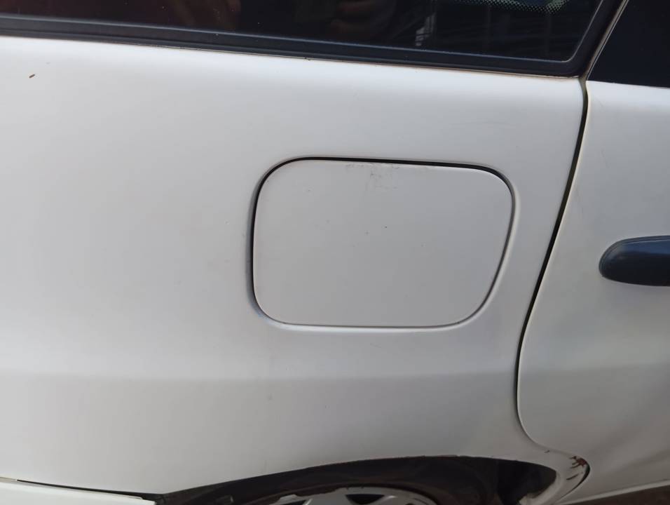 TAPA EXTERIOR COMBUSTIBLE