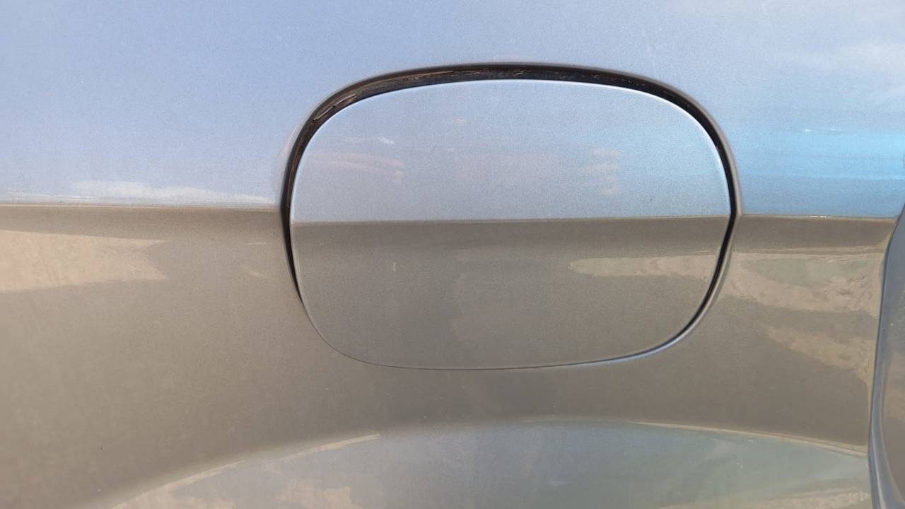 TAPA EXTERIOR COMBUSTIBLE