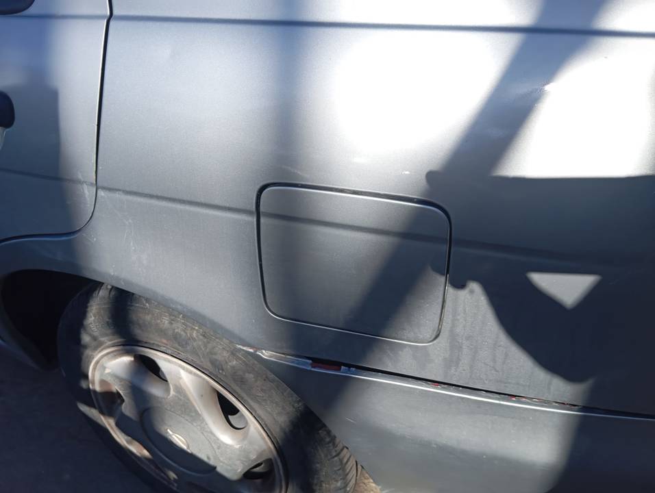 TAPA EXTERIOR COMBUSTIBLE