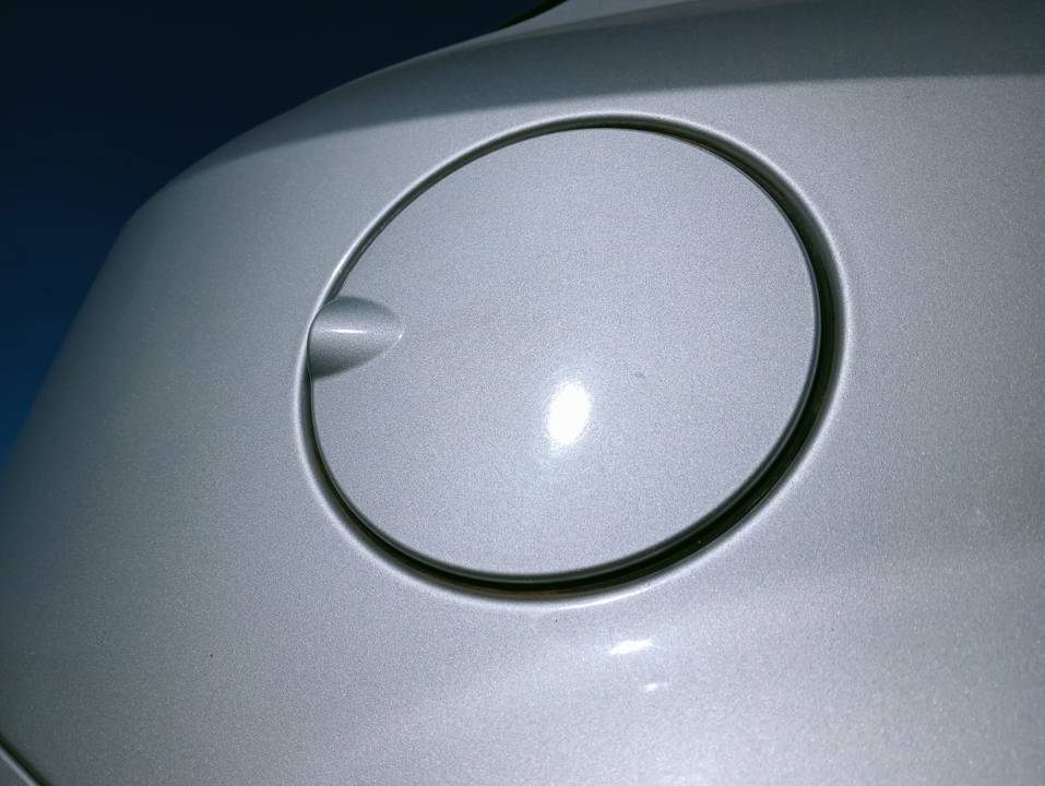 TAPA EXTERIOR COMBUSTIBLE