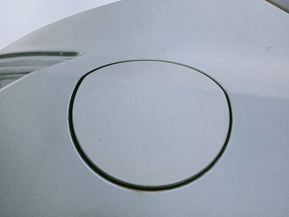 TAPA EXTERIOR COMBUSTIBLE