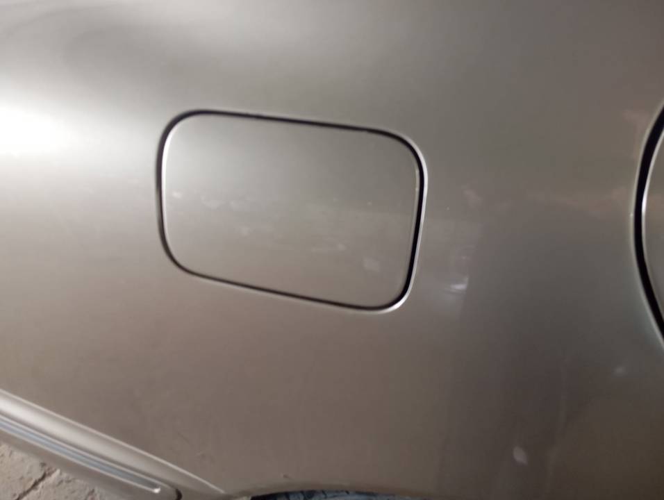TAPA EXTERIOR COMBUSTIBLE