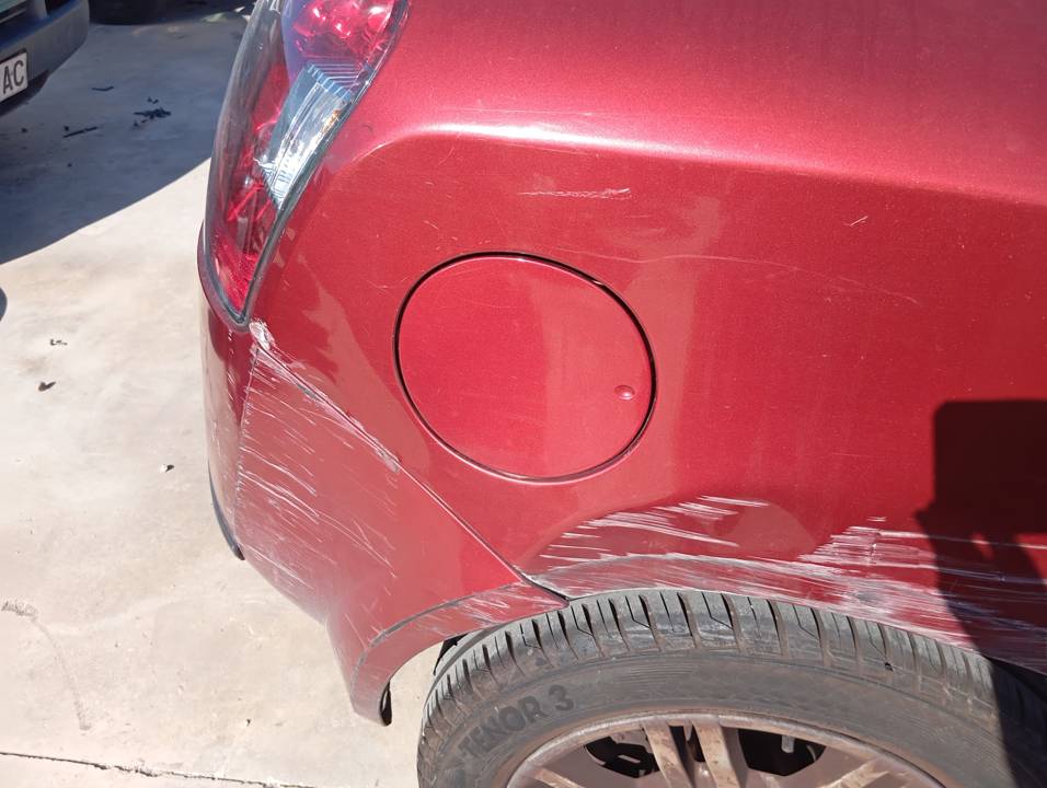 TAPA EXTERIOR COMBUSTIBLE