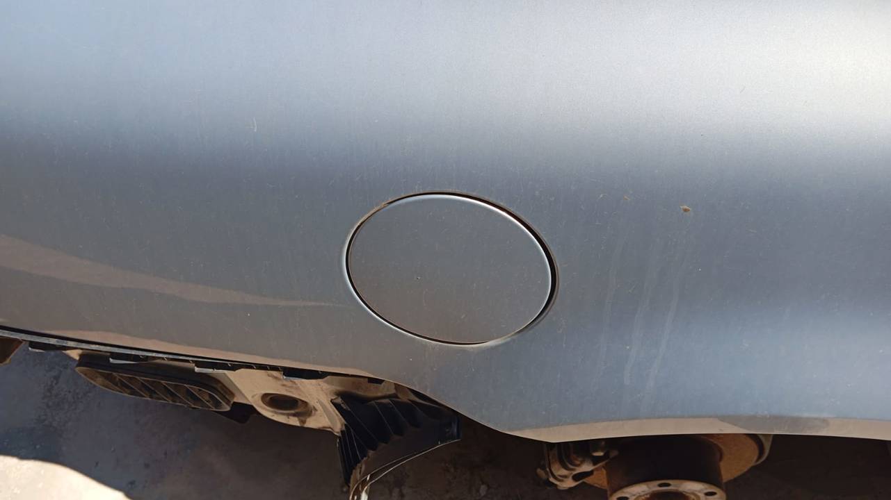 TAPA EXTERIOR COMBUSTIBLE
