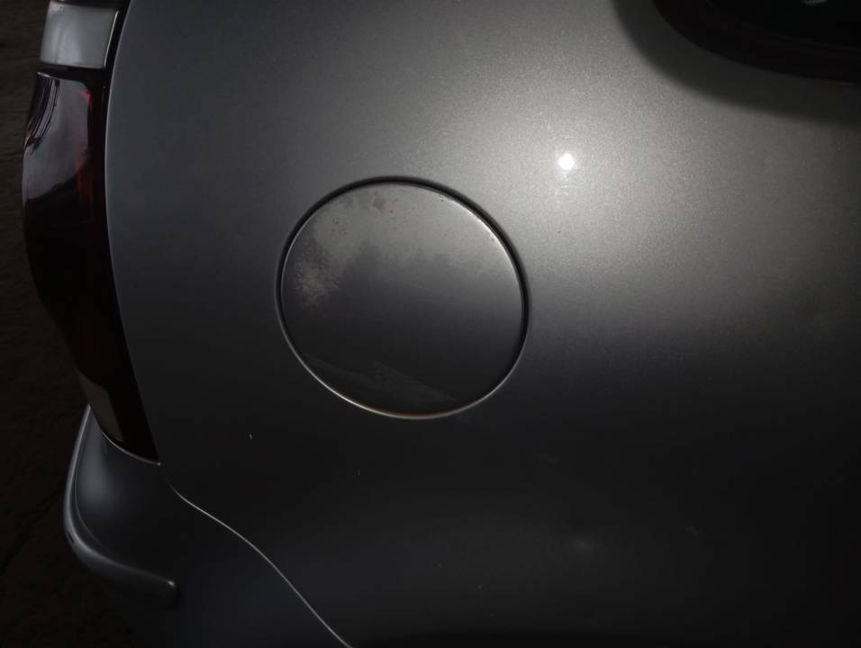 TAPA EXTERIOR COMBUSTIBLE