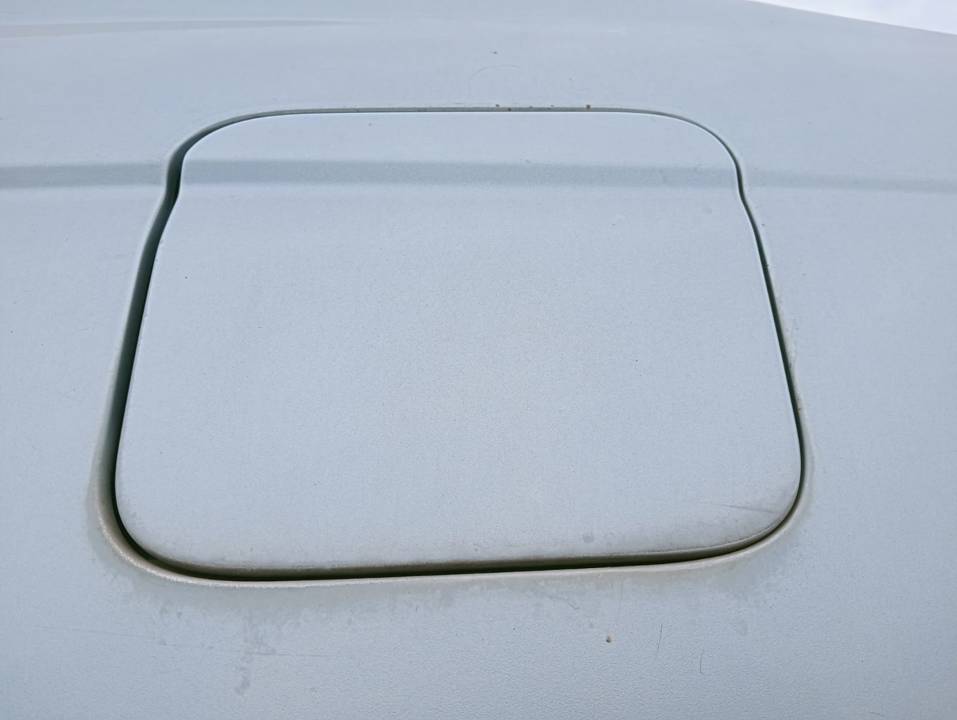 TAPA EXTERIOR COMBUSTIBLE