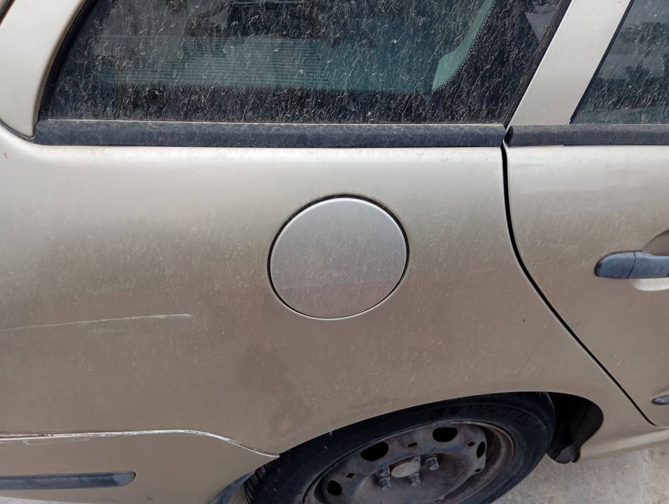 TAPA EXTERIOR COMBUSTIBLE