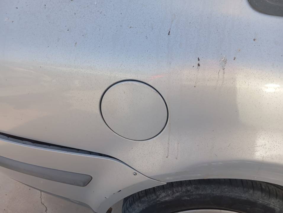 TAPA EXTERIOR COMBUSTIBLE