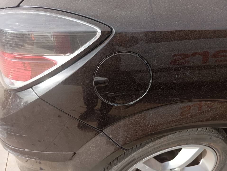 TAPA EXTERIOR COMBUSTIBLE
