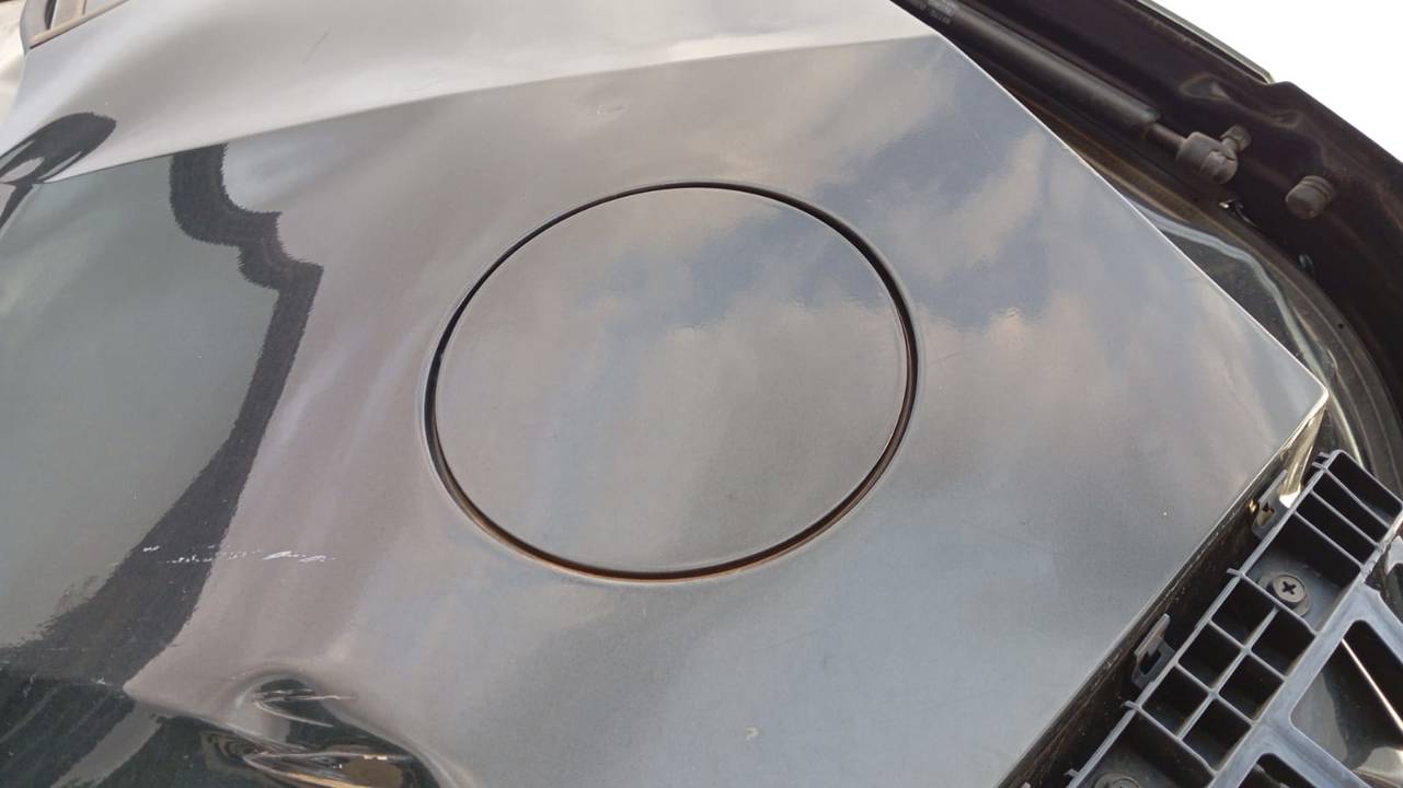 TAPA EXTERIOR COMBUSTIBLE