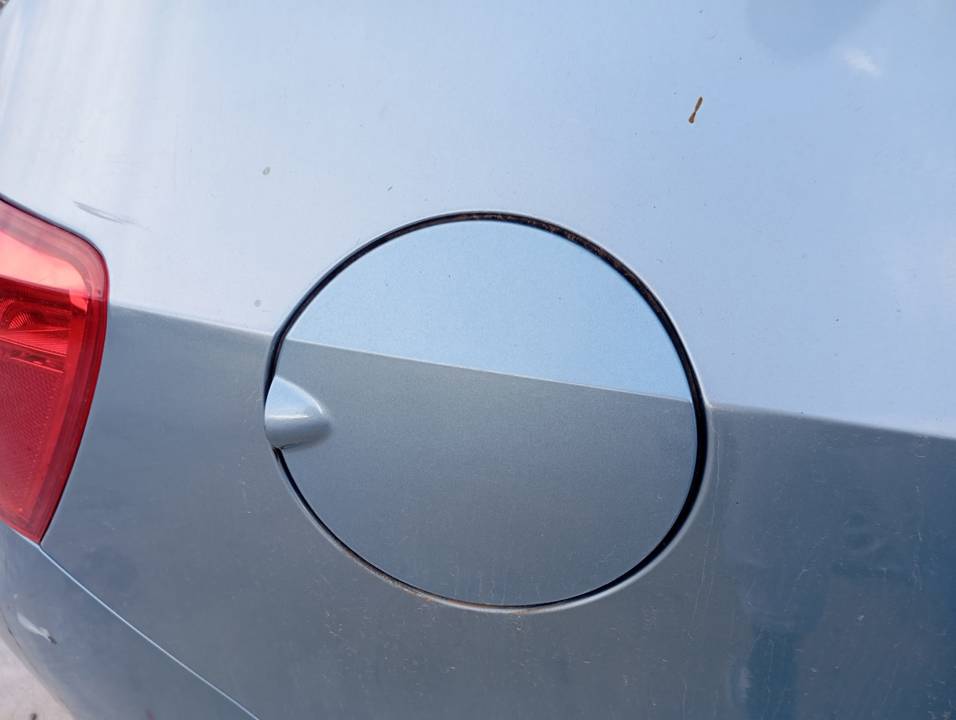 TAPA EXTERIOR COMBUSTIBLE