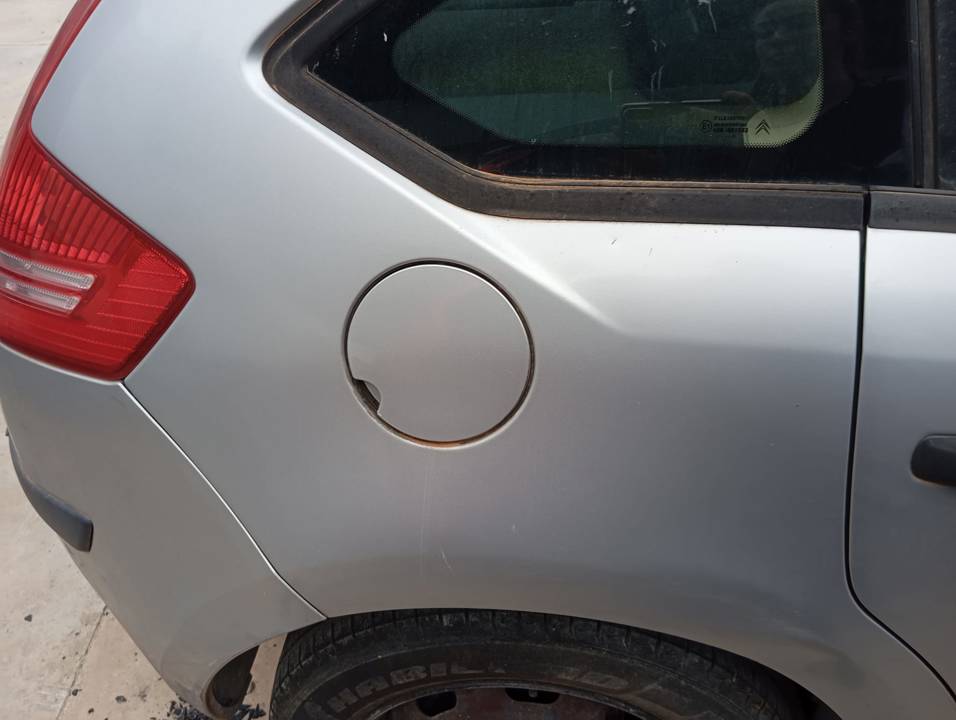 TAPA EXTERIOR COMBUSTIBLE